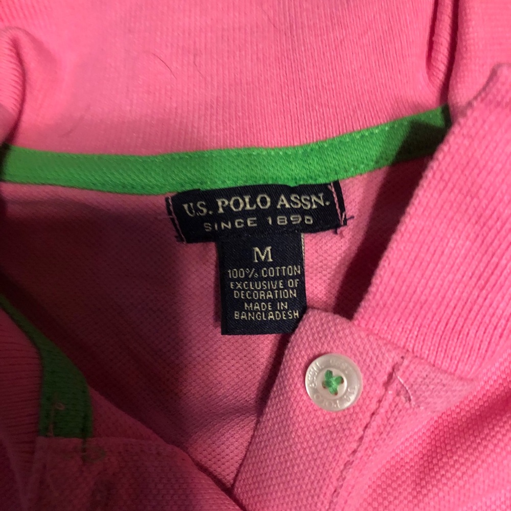 Pink fitted polo shirt worn once